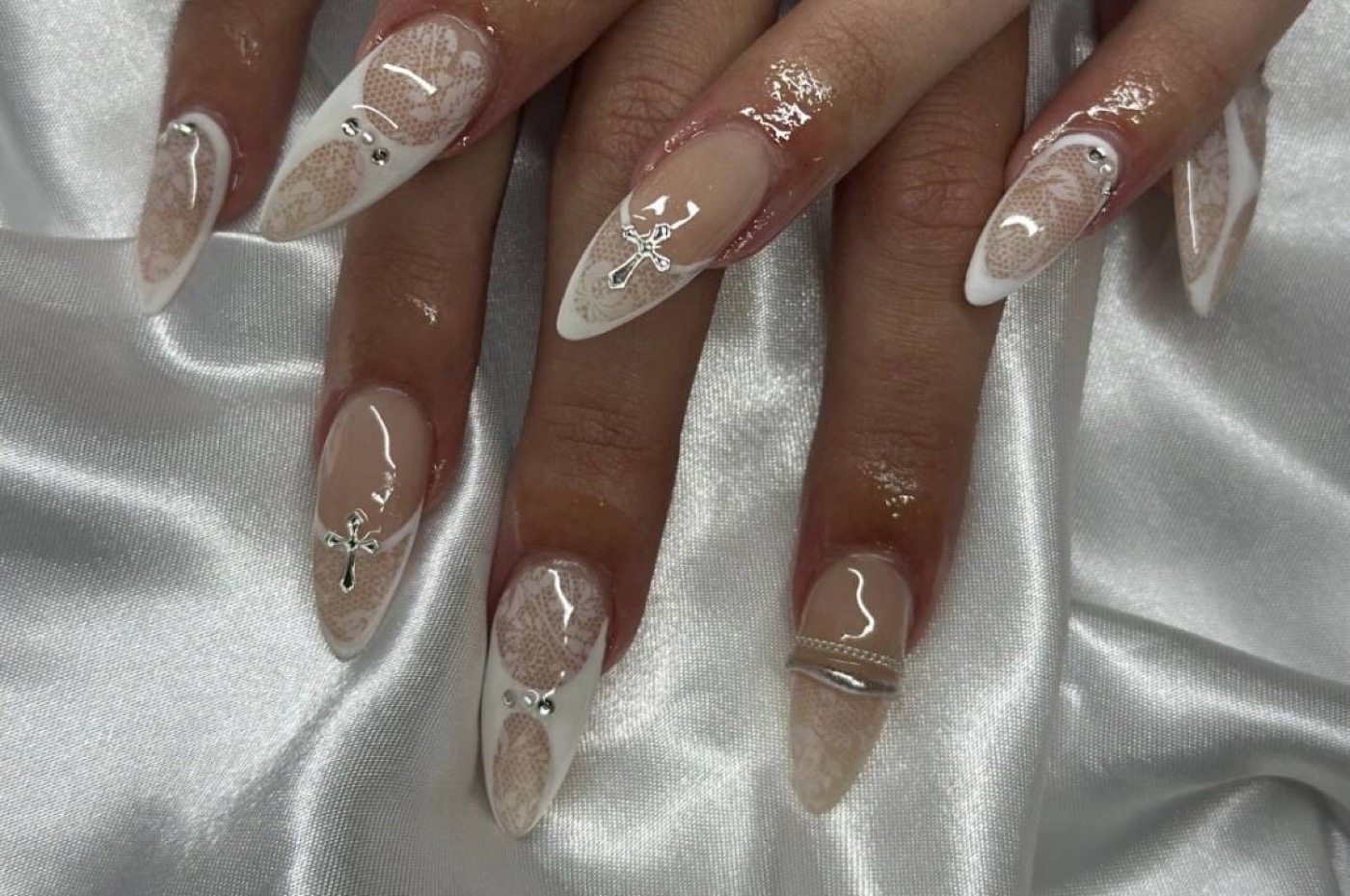 Clear almond nails with silver chrome detail